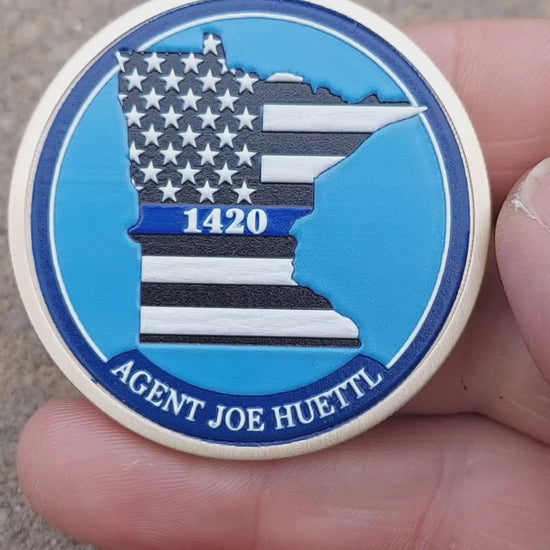 full color challenge coin agent huettl bca first responder design with badge and blue line state of minnesota
