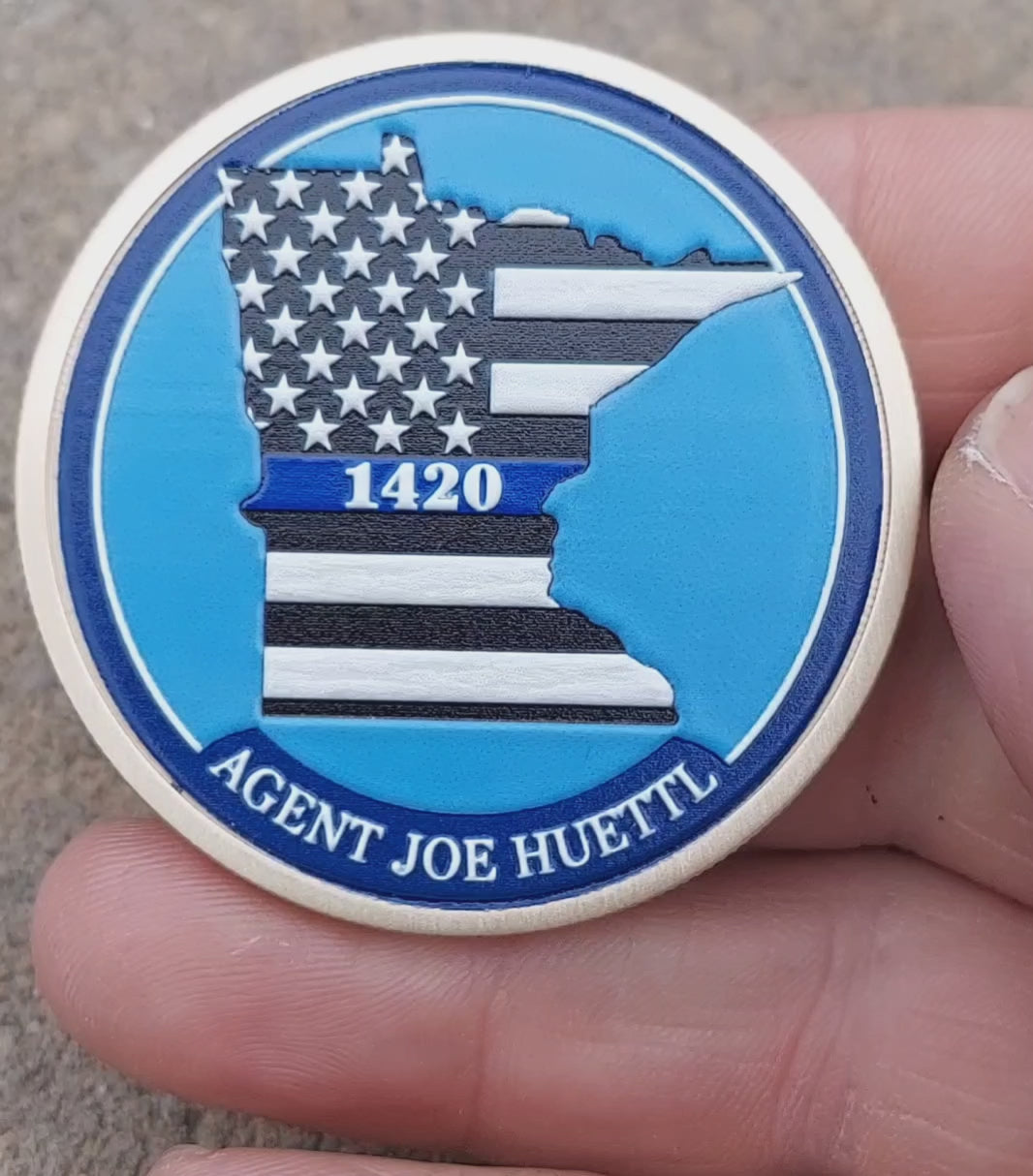 full color challenge coin agent huettl bca first responder design with badge and blue line state of minnesota